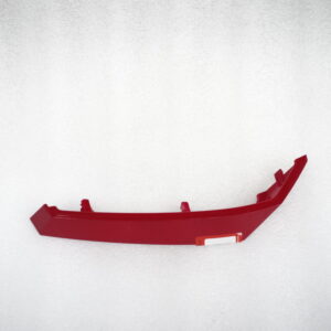 Łącznik obudowy przód prawy czerwona X-trail 125